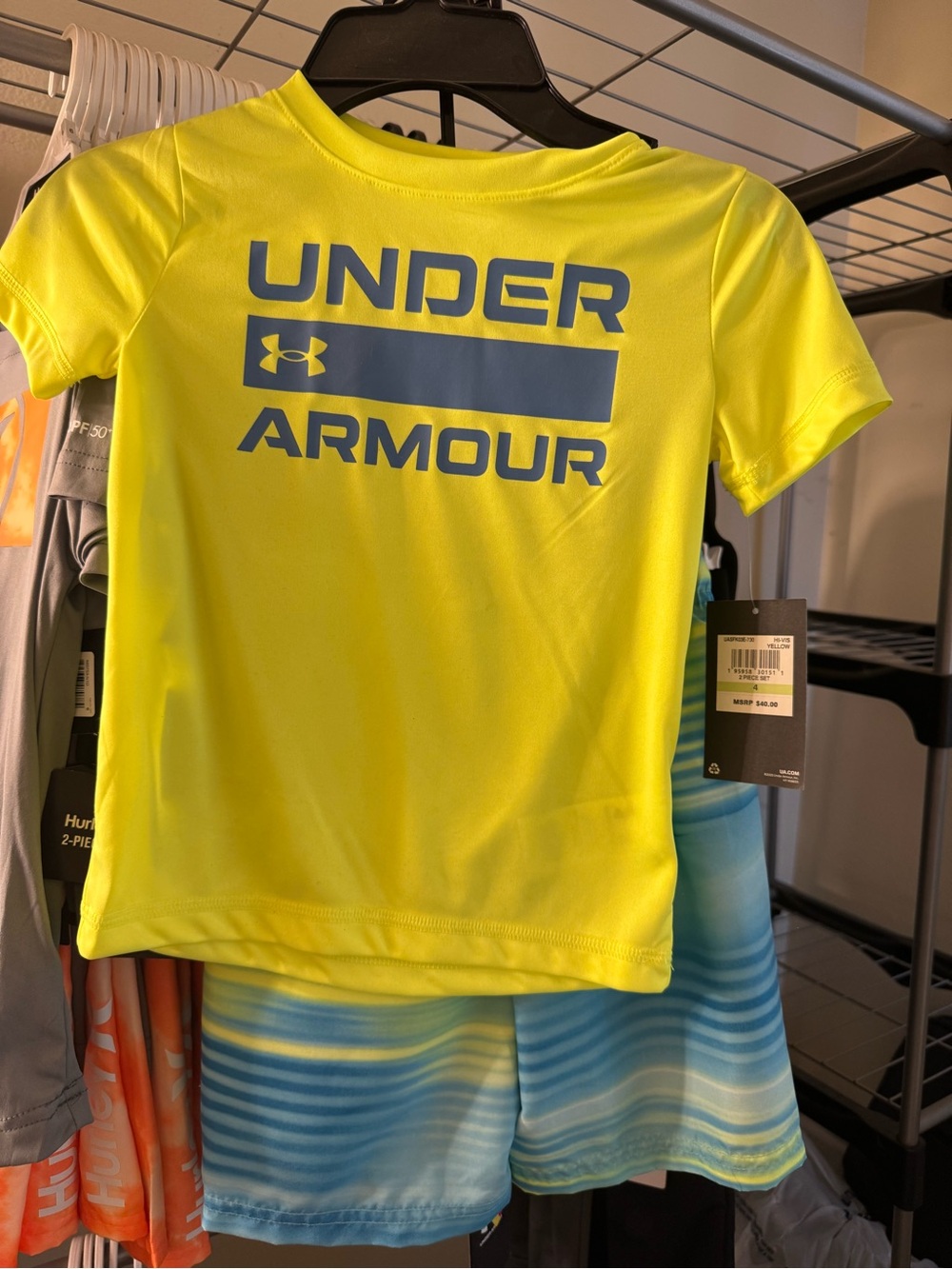 Under Armour Kids' Neon Yellow Short Sleeve Swim Rashguard with Blue Logo